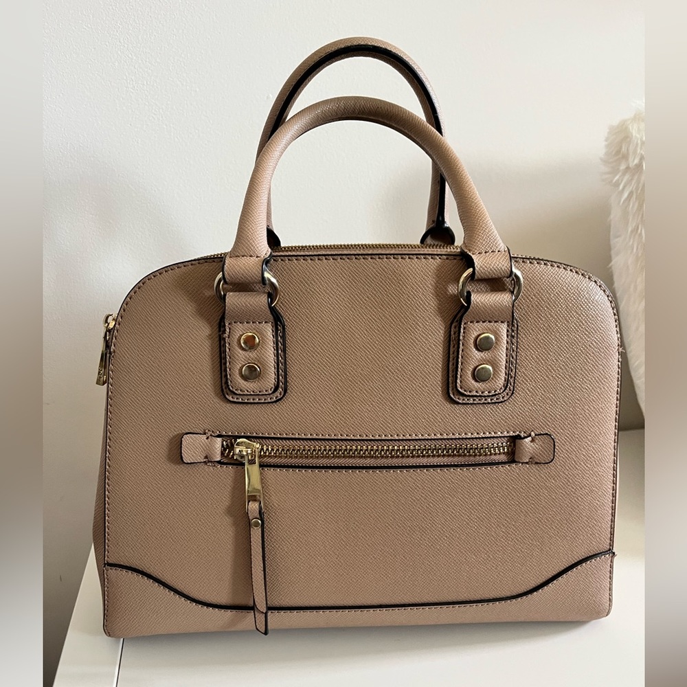 Beige hand bag from Aldo. Lightly used.